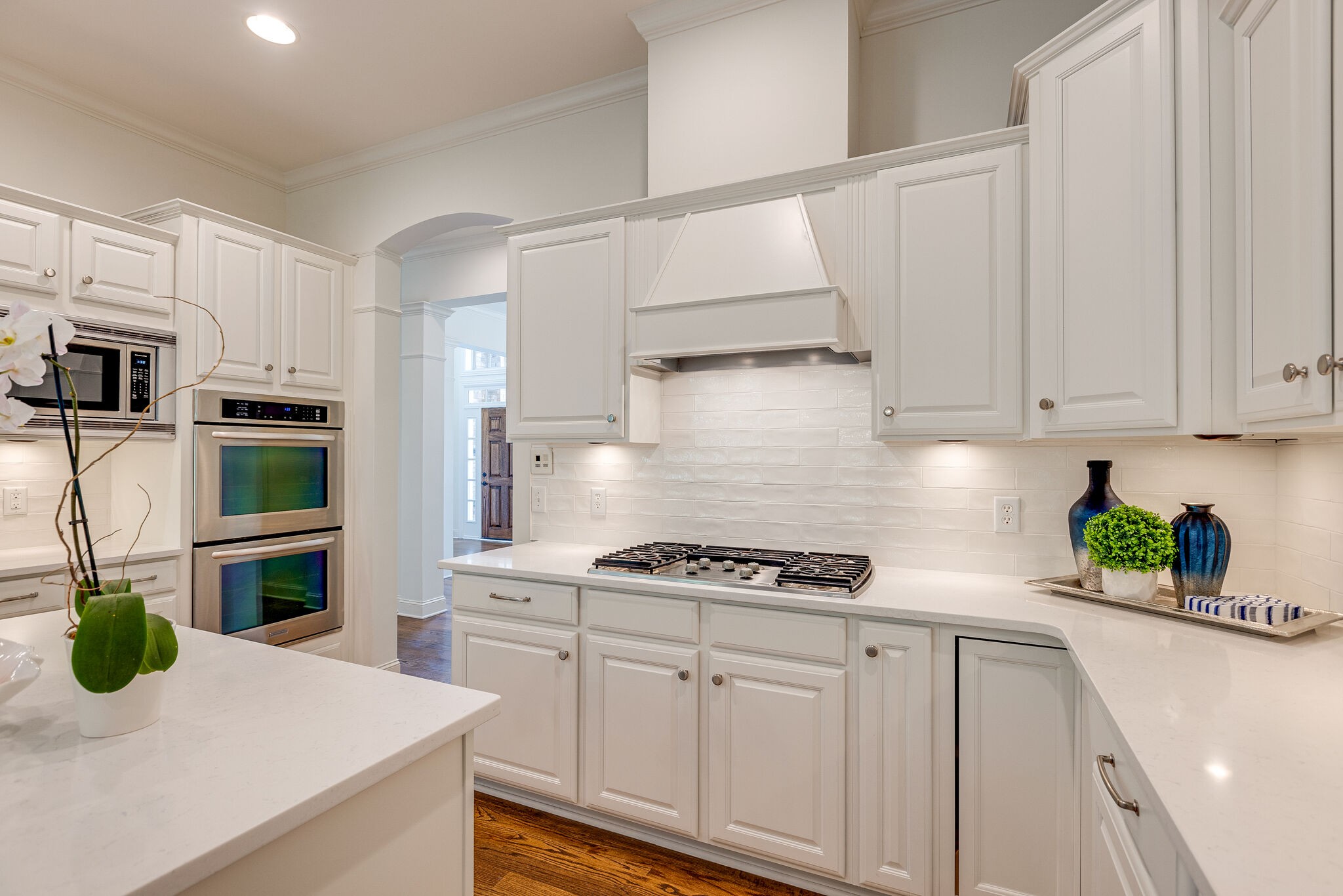 1327 Cottingham Drive Franklin, TN 37067 - Photo 24 of 70 a kitchen with white cabinets and appliances