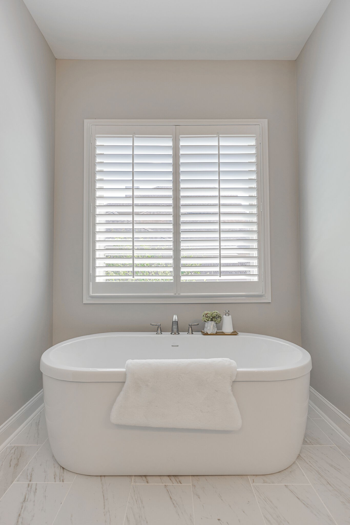 1327 Cottingham Drive Franklin, TN 37067 - Photo 35 of 70 a white bath tub sitting in a bathroom next