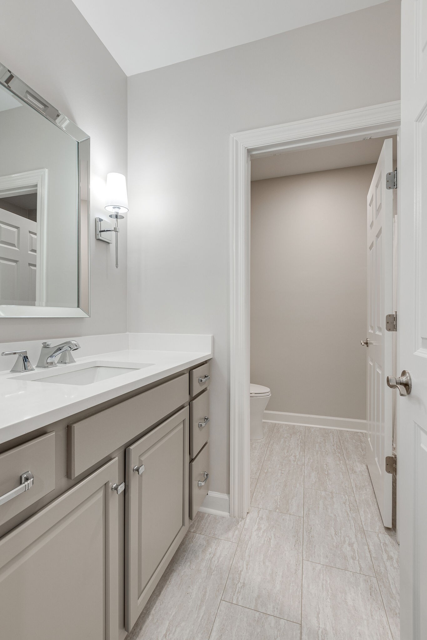 1327 Cottingham Drive Franklin, TN 37067 - Photo 49 of 70 a bathroom with a sink a vanity and a mirror