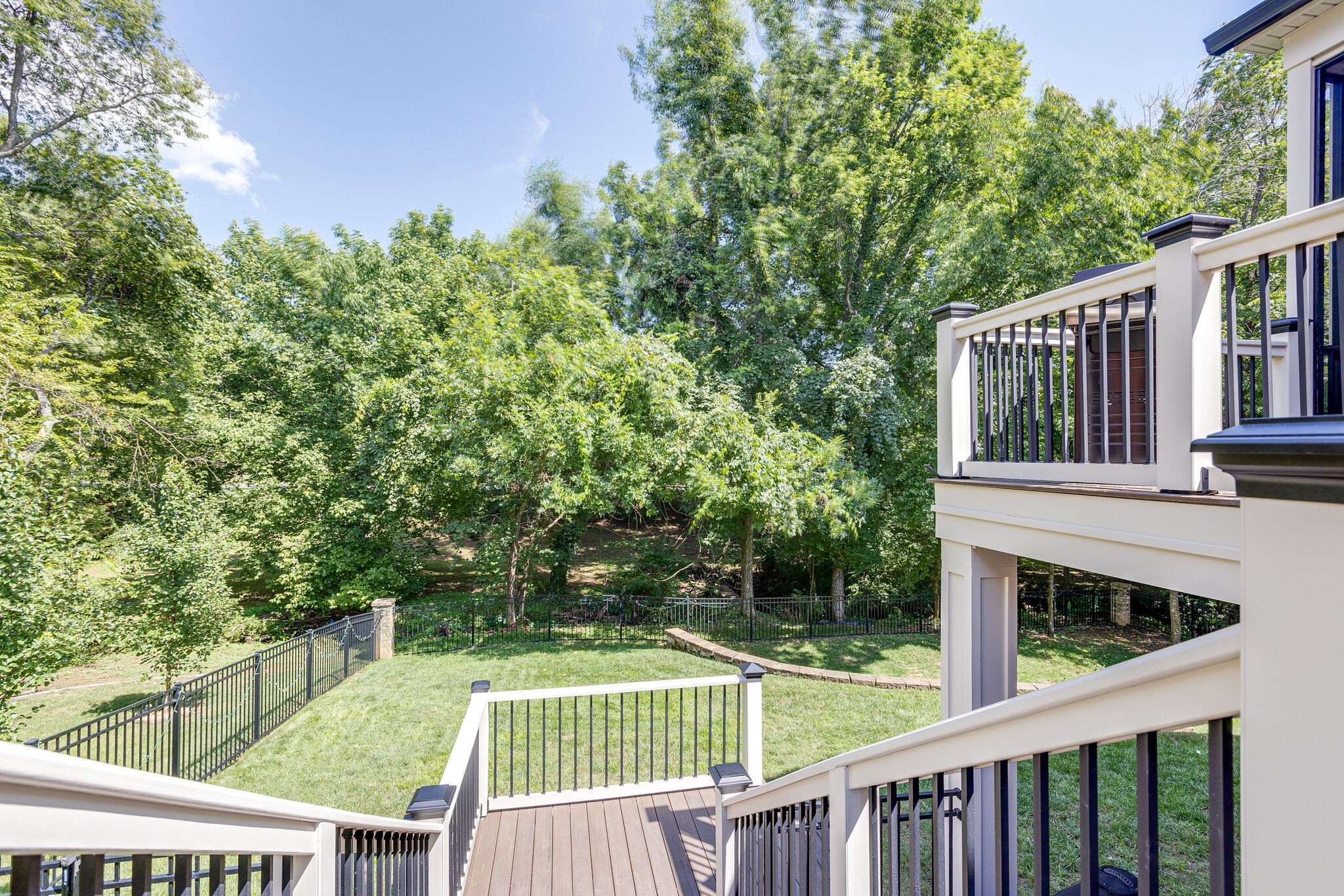 1327 Cottingham Drive Franklin, TN 37067 - Photo 60 of 70 a view of a roof deck with wooden fence and floor