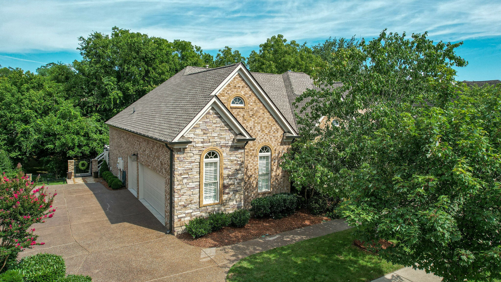 1327 Cottingham Drive Franklin, TN 37067 - Photo 62 of 70 a view of a wooden house with a small yard and large trees