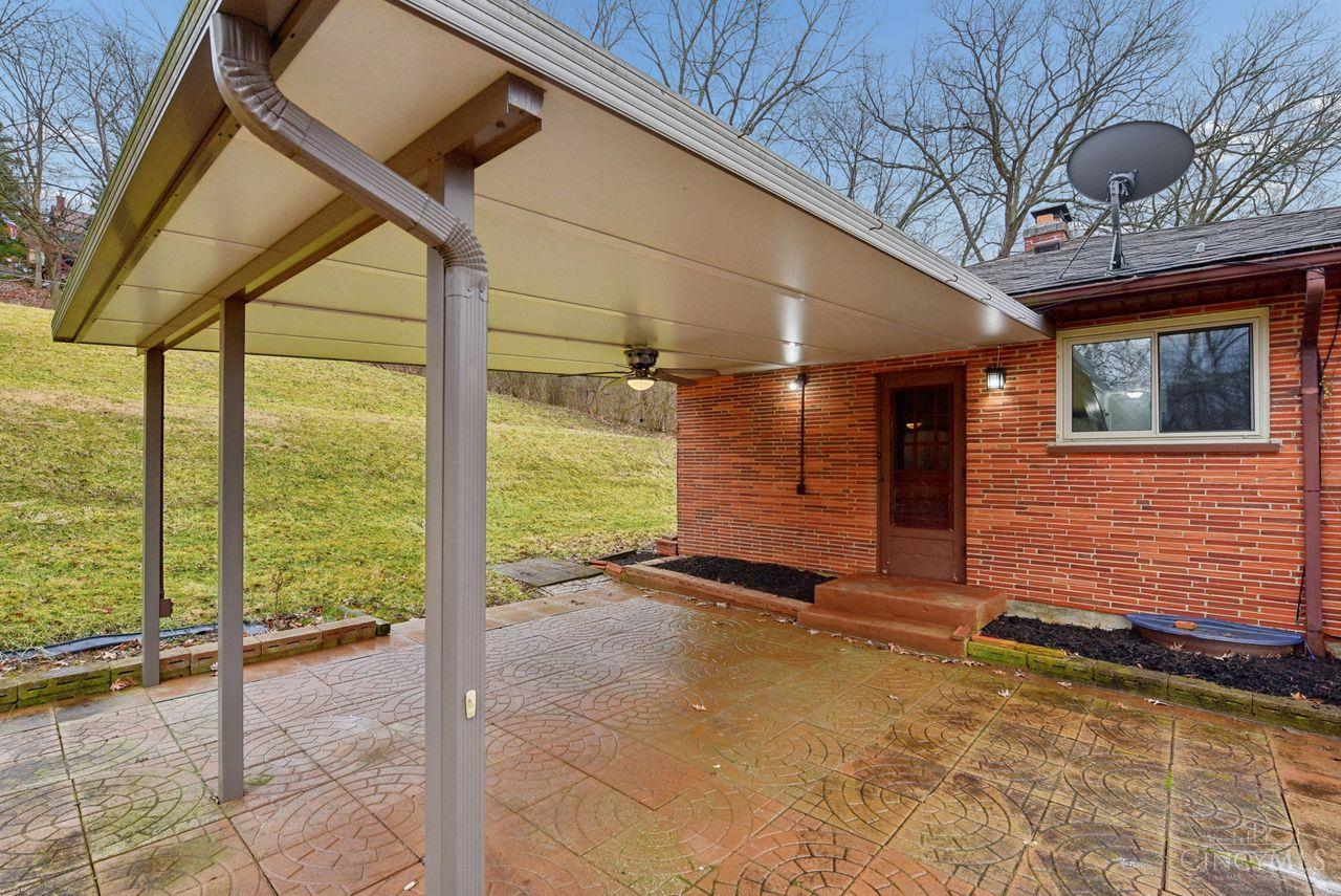 5258 Shepherd Road Cincinnati, OH 45223 - Photo 41 of 43 The Covered Patio is easily accessed from the front of the house, the Kitchen, and the Back Yard! The Lighted Ceiling Fan will help keep you cool on hot summer days!