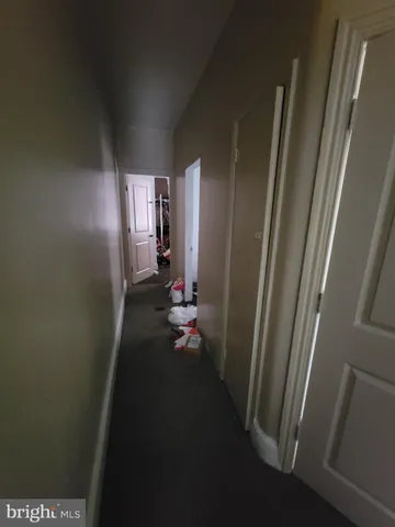 a bedroom with a bed and a table