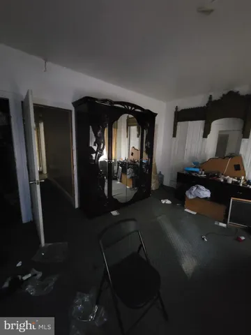 a bathroom with a sink and mirror with toilet
