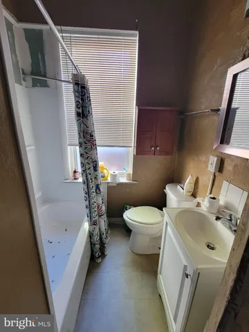 a view of a workspace with furniture