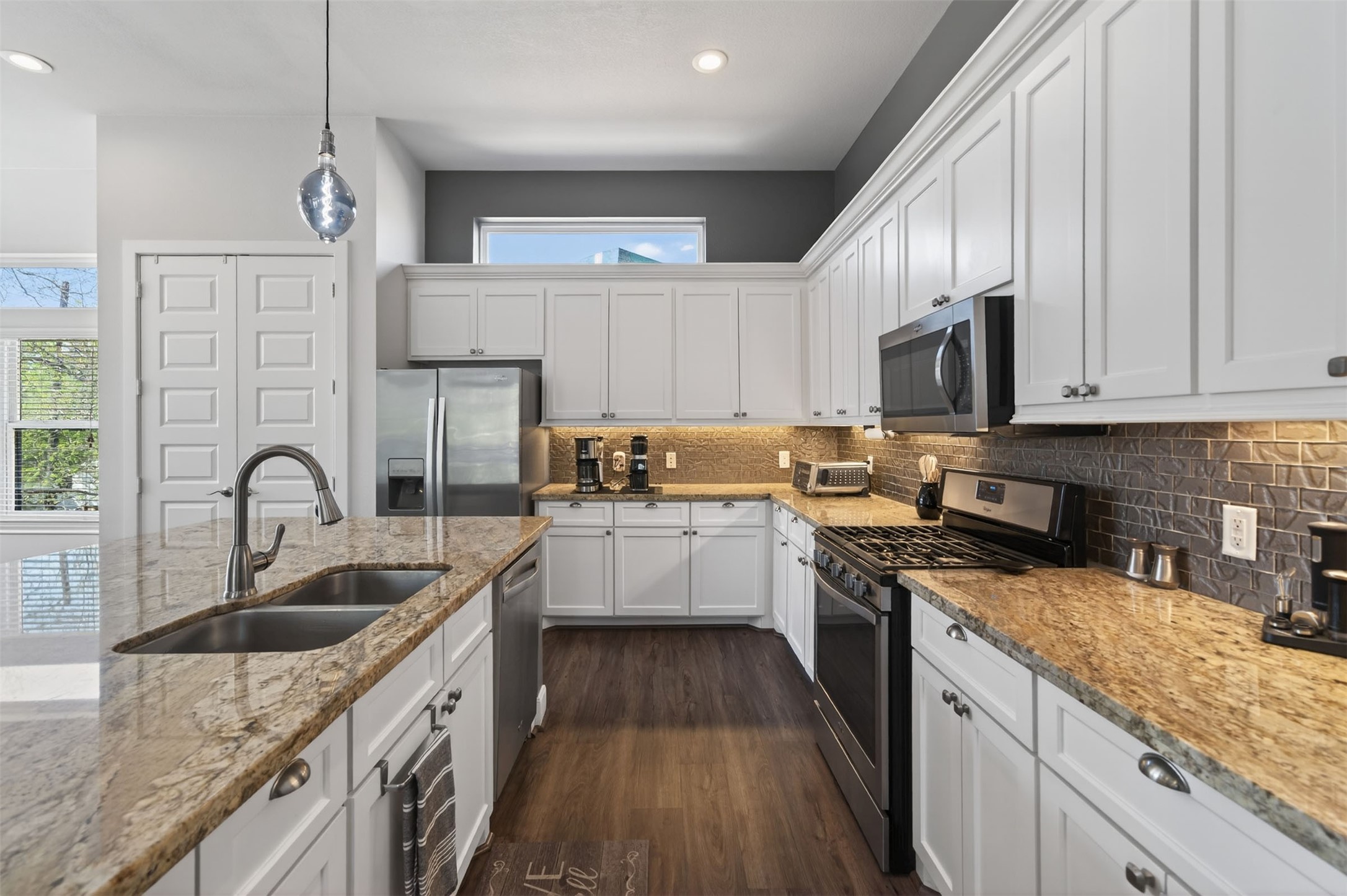 3347 Kilgore Street Houston, TX 77021 - Photo 1 of 32 The stylish kitchen is full of modern charm!