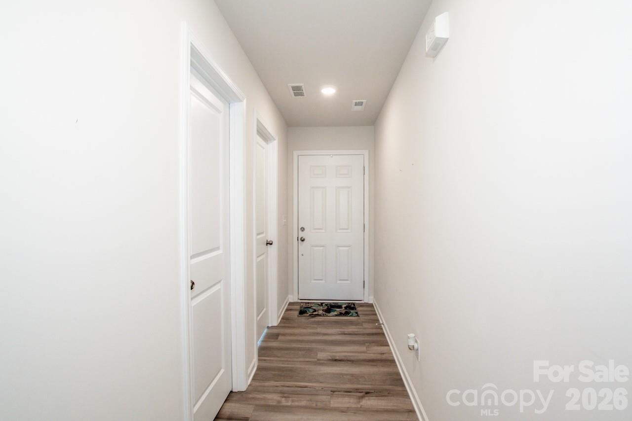 2742 Legacy Ridge Lane Catawba, NC 28609 - Photo 10 of 36 a view of a hallway with a black and white walls