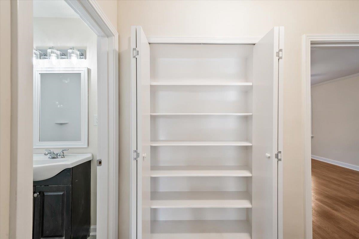 753 Ivy Road Memphis, TN 38117 - Photo 16 of 25 a view of cabinets with wooden floor