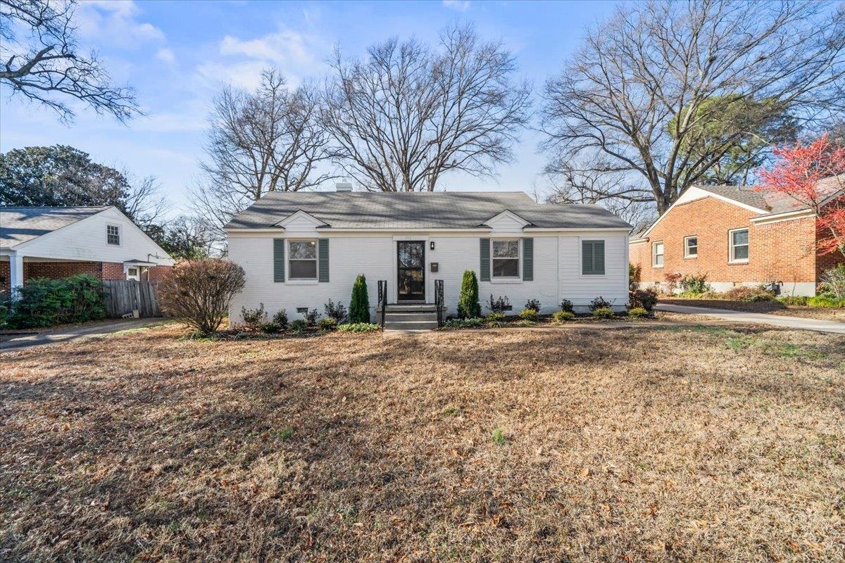 753 Ivy Road Memphis, TN 38117 - Photo 2 of 25 a front view of a house with garden