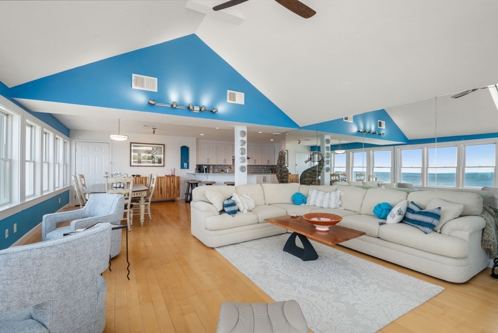 66 Glades Road, Unit 8 Scituate, MA 02066 - Photo 9 of 27 a living room with furniture and a ceiling fan