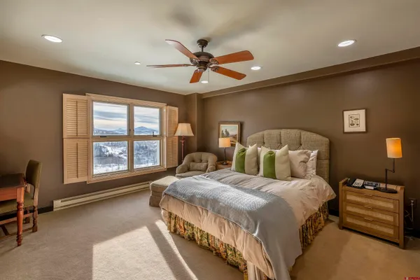 a bed room with a bed and furniture