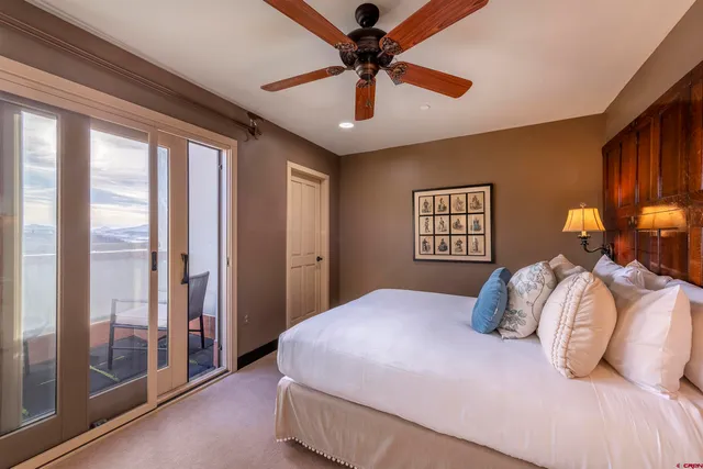 a bed room with a bed and furniture