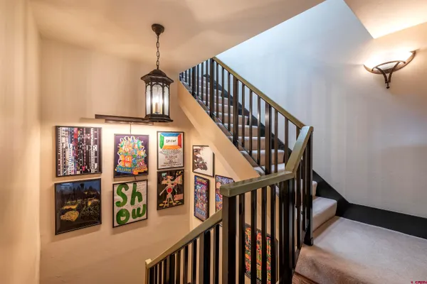 a view of a swimming pool with an outdoor seating