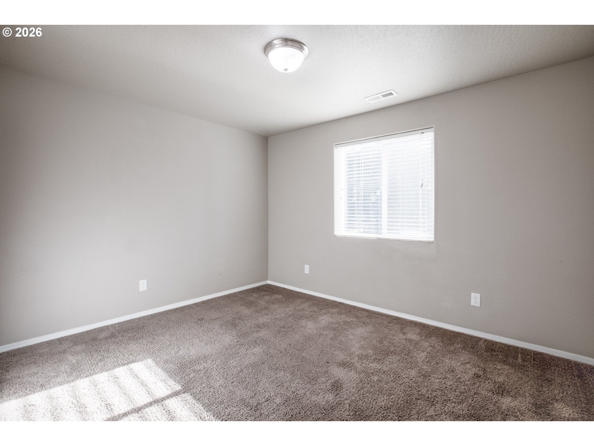 2952 Shelby Way Eugene, OR 97404 - Photo 19 of 25 a view of an empty room with a window