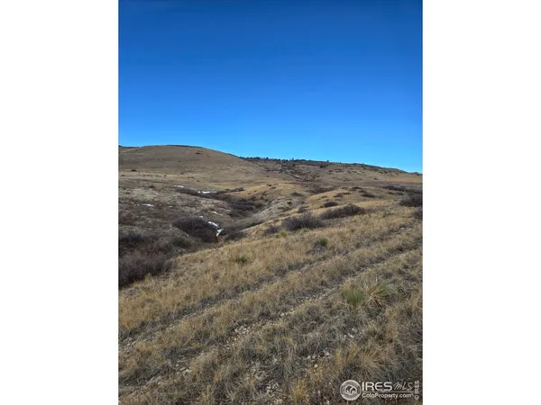 a picture of a bathroom with a shower