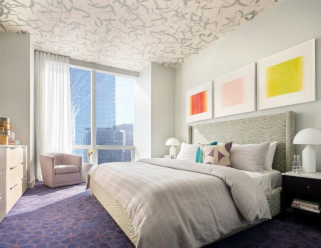 15 Hudson Yards, Unit 25H Manhattan, NY 10001 - Photo 11 of 16 a bedroom with a bed and a couch