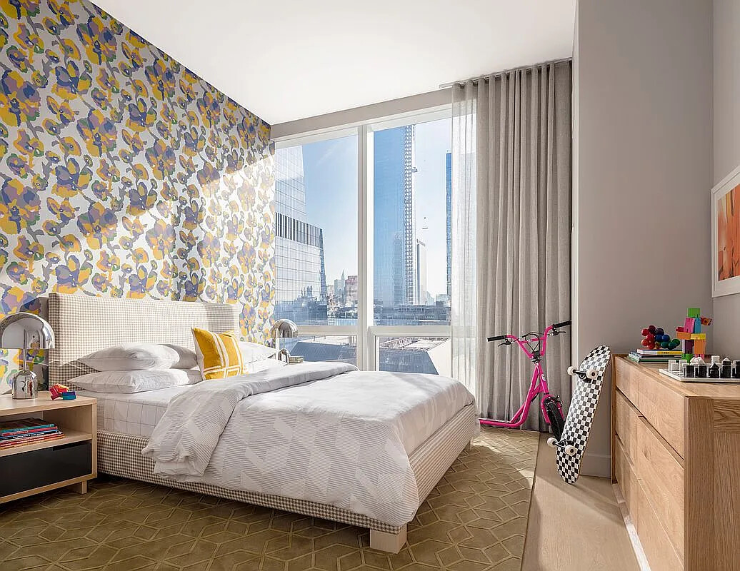15 Hudson Yards, Unit 25H Manhattan, NY 10001 - Photo 12 of 16 a bedroom with a bed and a window