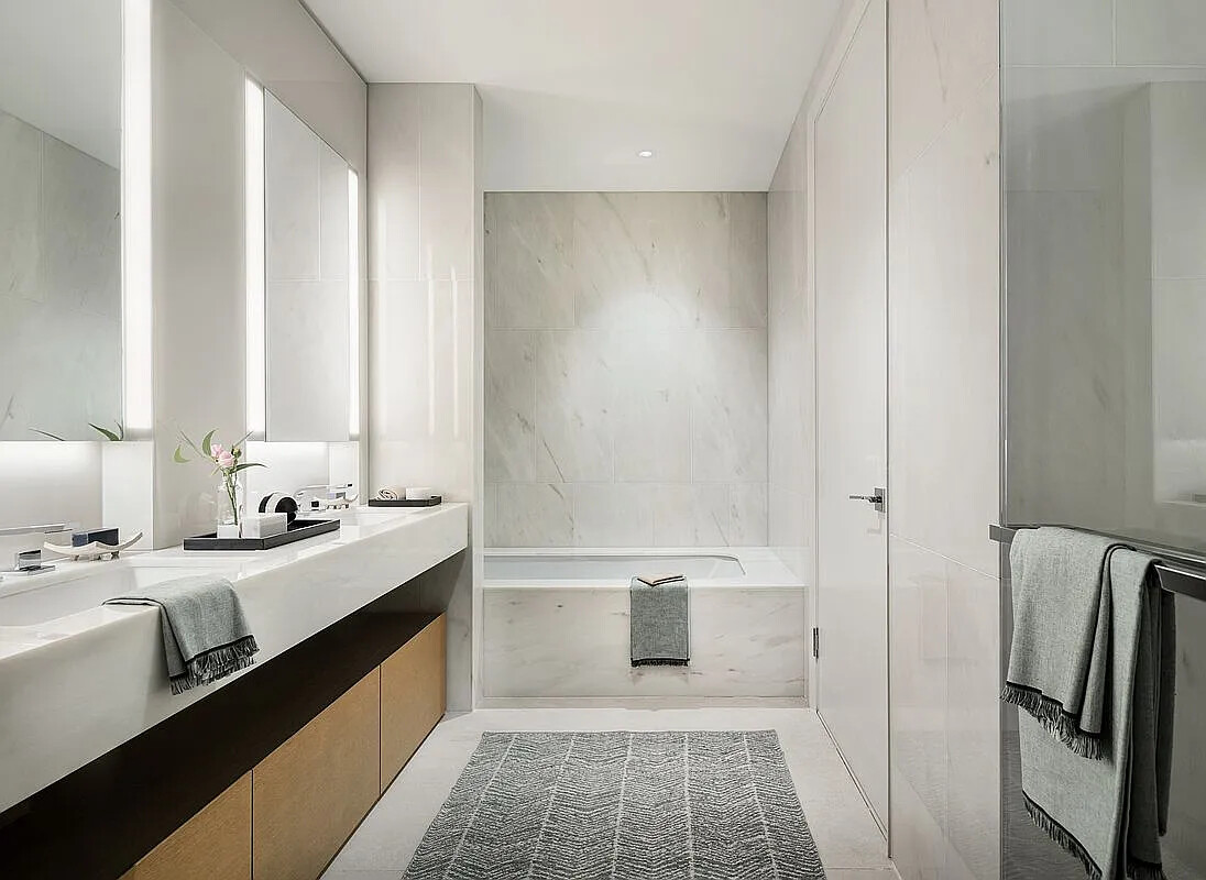 15 Hudson Yards, Unit 25H Manhattan, NY 10001 - Photo 14 of 16 a bathroom with a double vanity sink a toilet and a shower