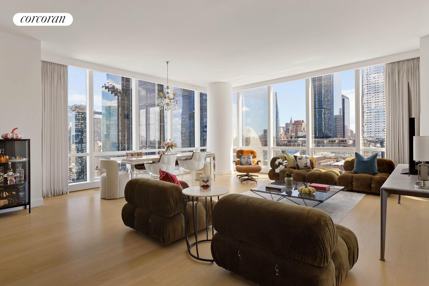 15 Hudson Yards, Unit 25H Manhattan, NY 10001 - Photo 1 of 16 a living room with furniture and large windows