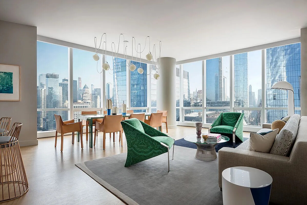 15 Hudson Yards, Unit 25H Manhattan, NY 10001 - Photo 4 of 16 a living room with furniture and a large window