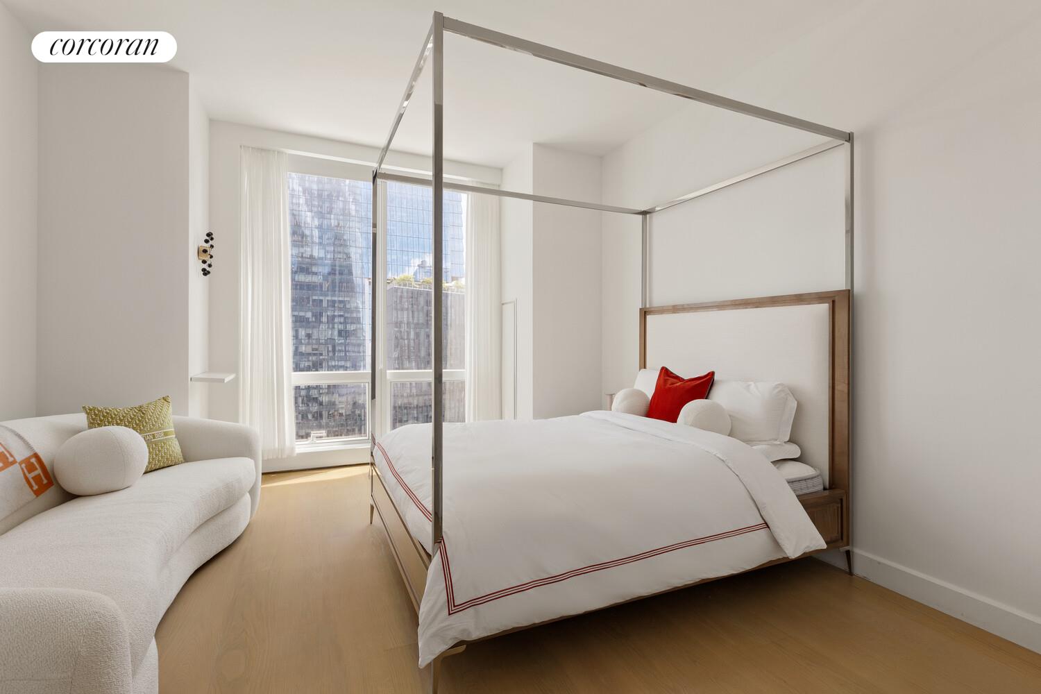 15 Hudson Yards, Unit 25H Manhattan, NY 10001 - Photo 6 of 16 a bedroom with a bed and a window