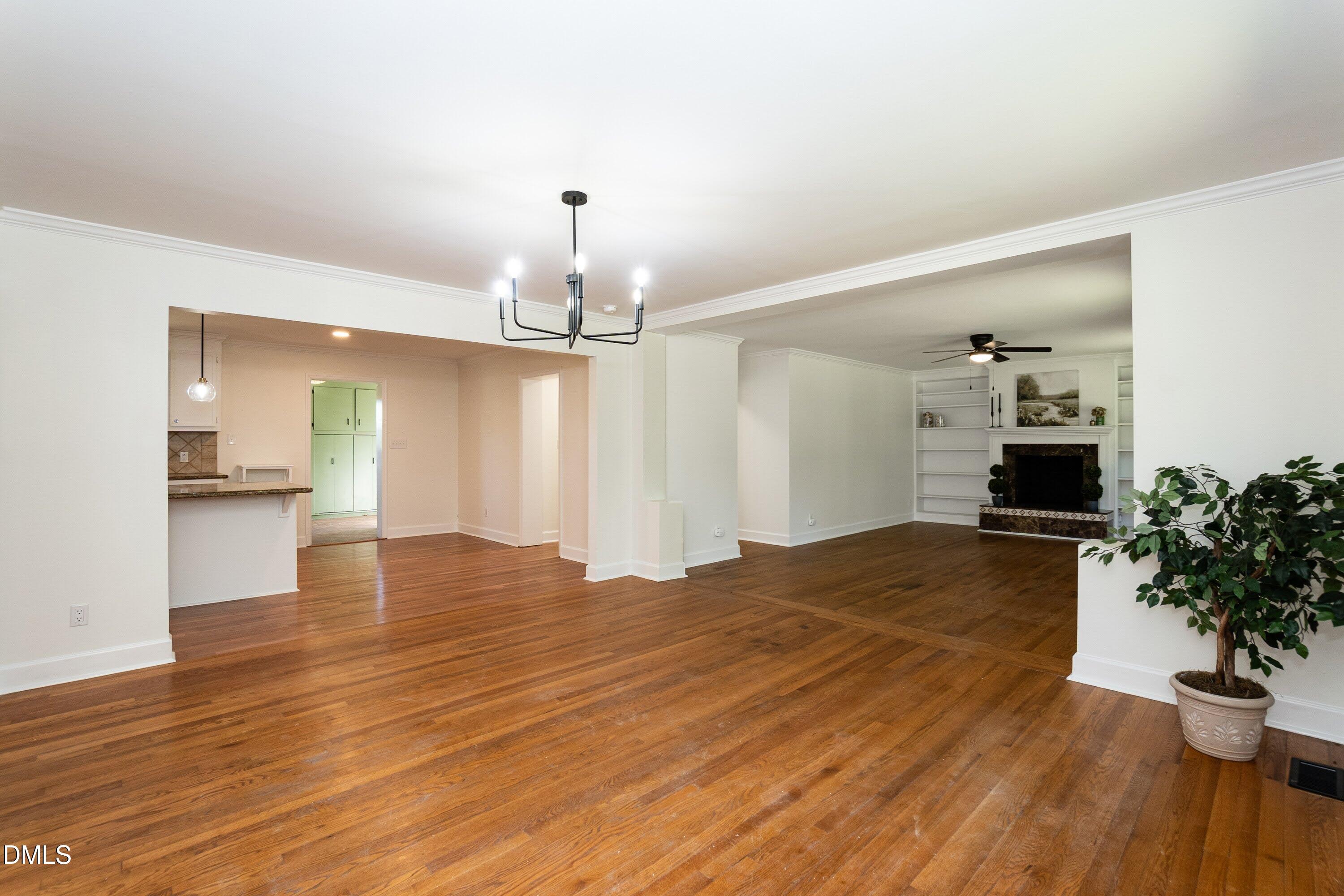 641 Rocky Ford Road Louisburg, NC 27549 - Photo 12 of 38 a view of empty room with wooden floor