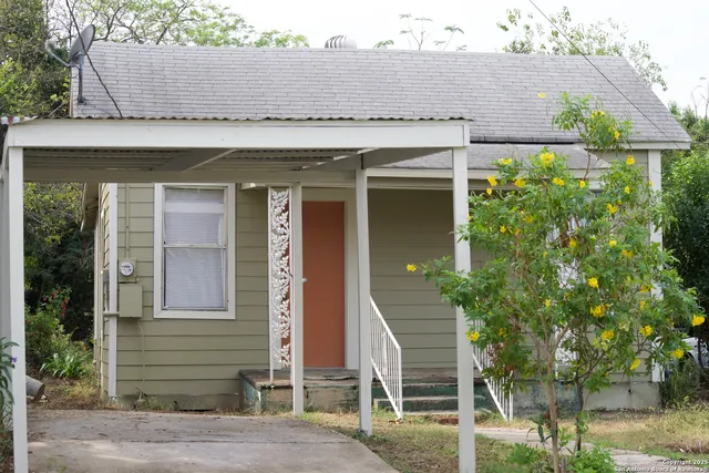 a kitchen with stainless steel appliances a sink a stove and a microwave