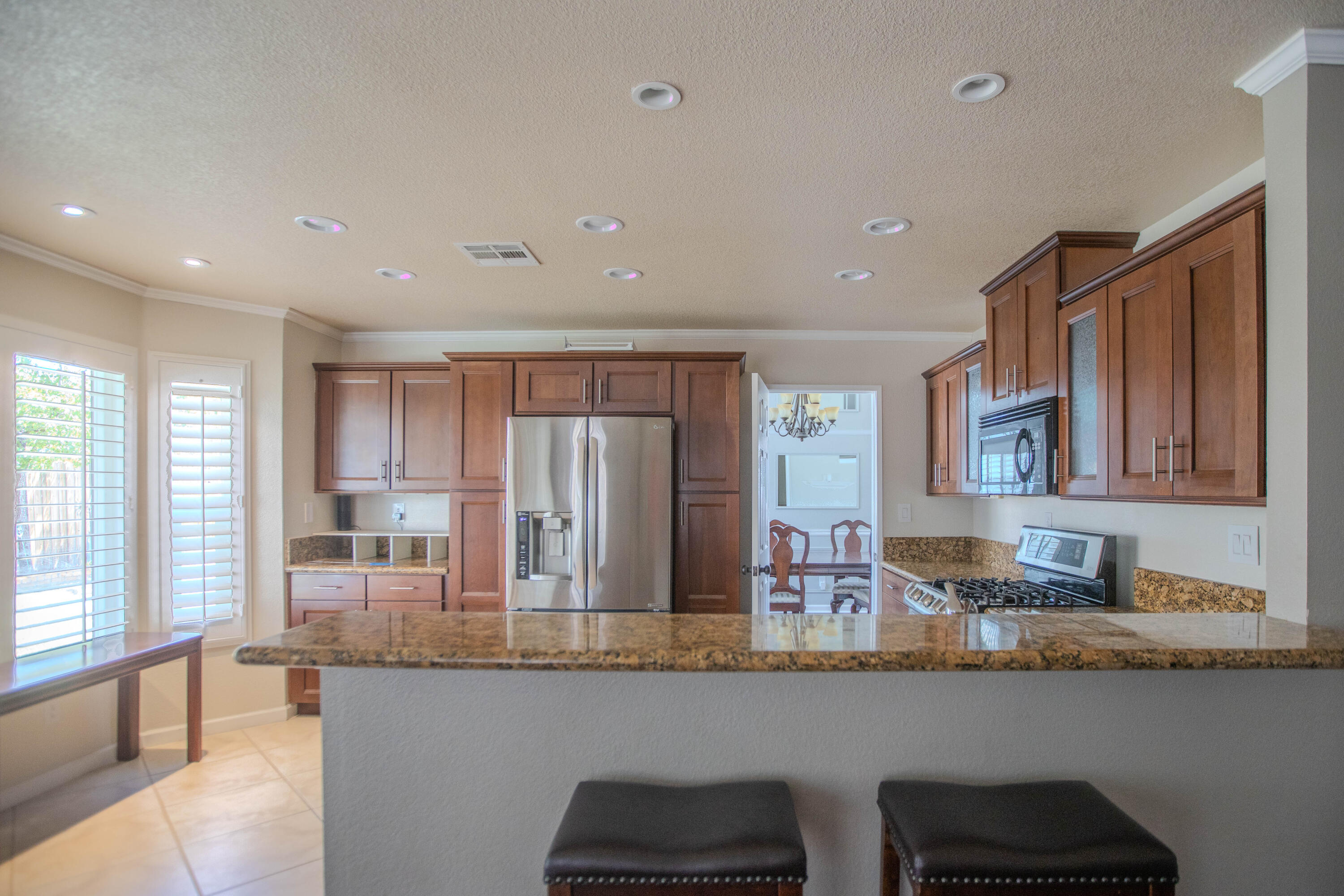 36852 Vía Del Rio Palmdale, CA 93550 - Photo 13 of 34 a kitchen with counter top space and windows