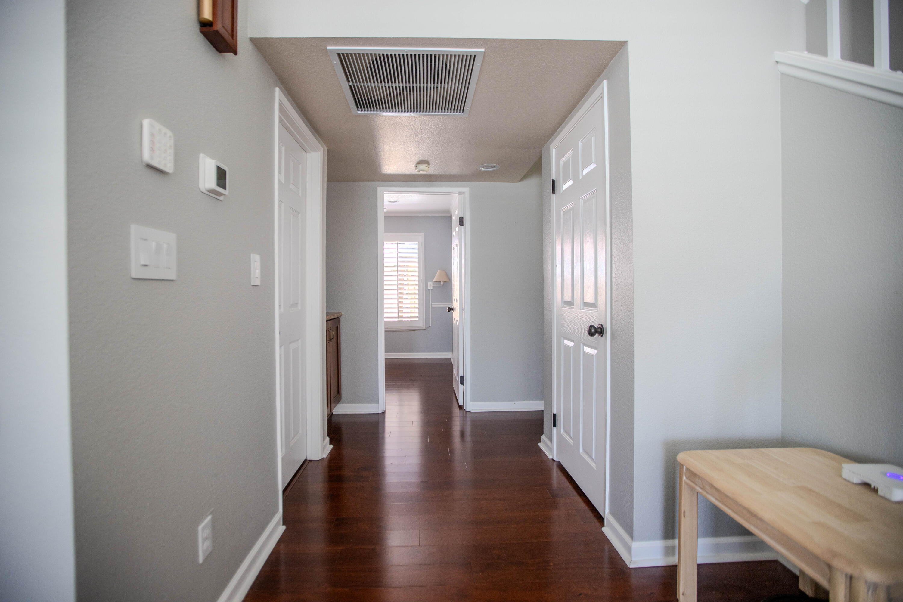 36852 Vía Del Rio Palmdale, CA 93550 - Photo 14 of 34 a view of a hallway with wooden floor