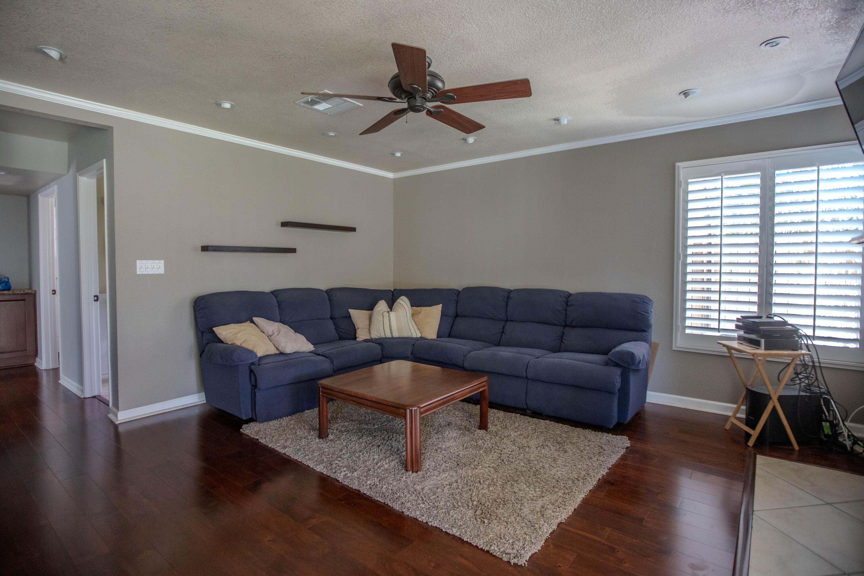 36852 Vía Del Rio Palmdale, CA 93550 - Photo 15 of 34 a living room with furniture and a window