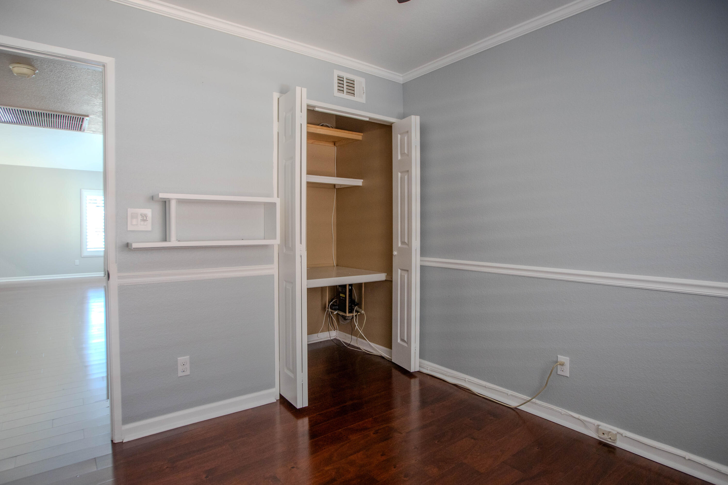 36852 Vía Del Rio Palmdale, CA 93550 - Photo 21 of 34 an empty room with wooden floor & closet