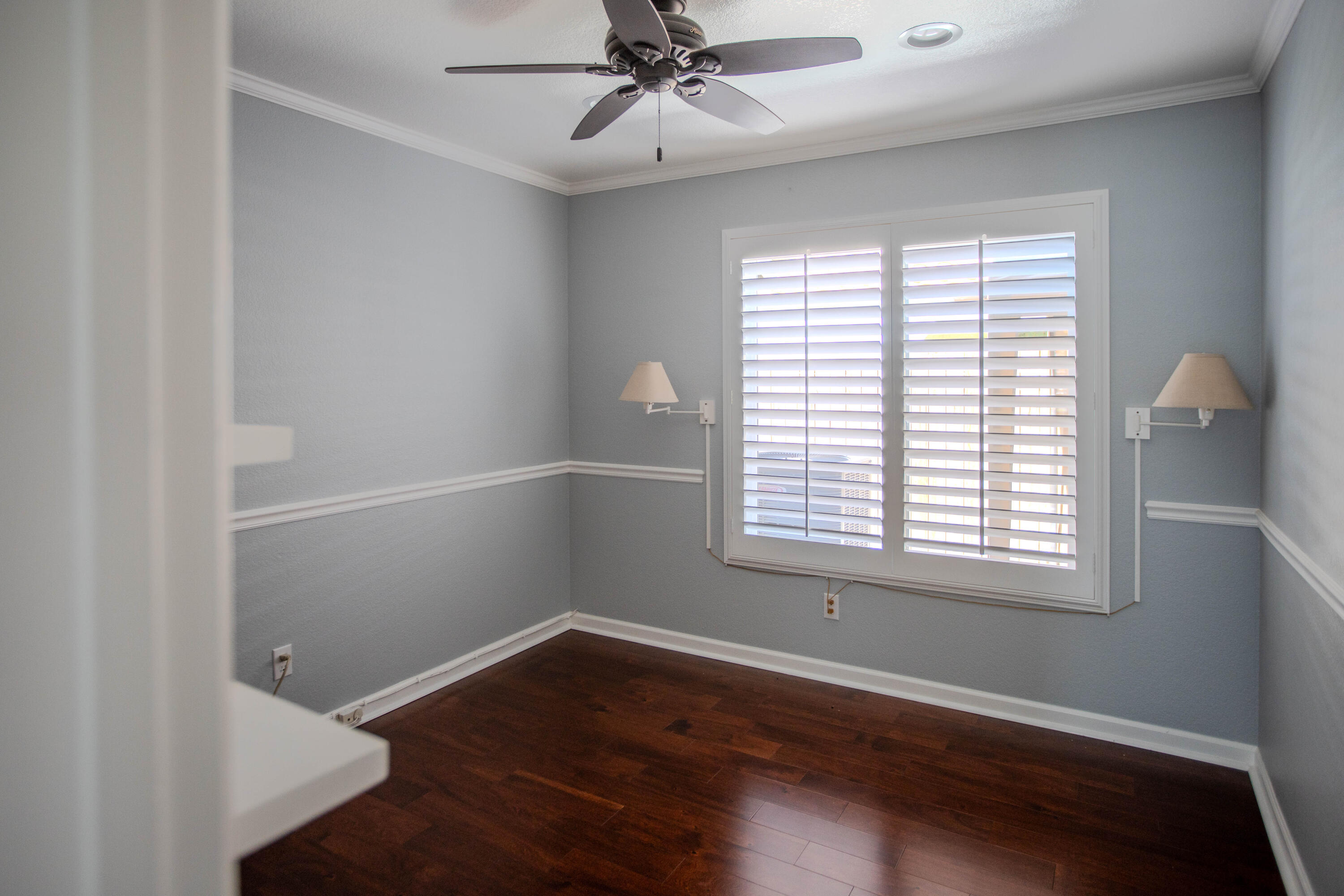 36852 Vía Del Rio Palmdale, CA 93550 - Photo 22 of 34 a view of an empty room with wooden floor and a window