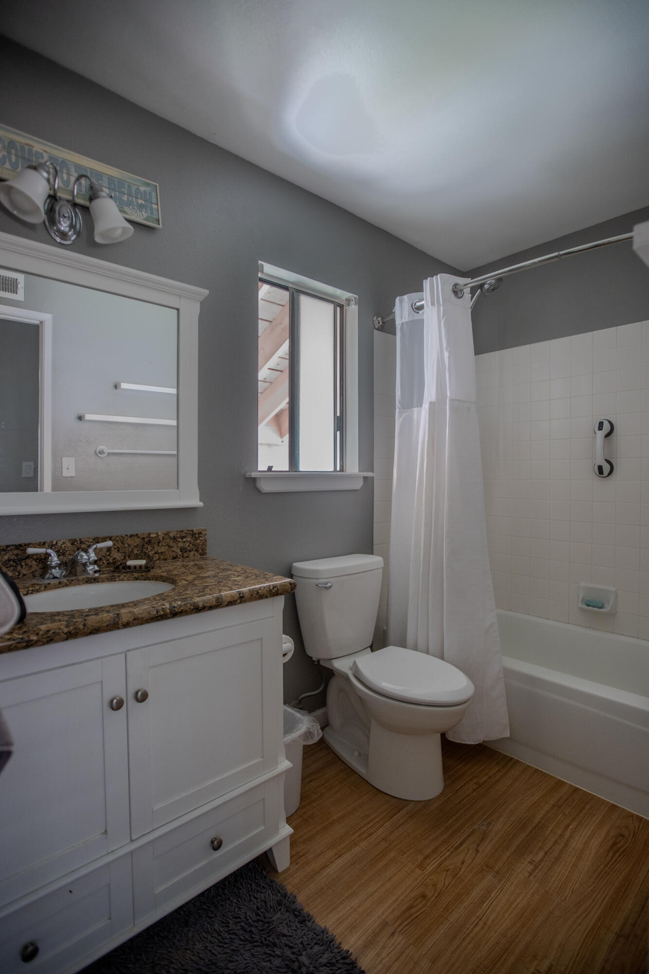 36852 Vía Del Rio Palmdale, CA 93550 - Photo 25 of 34 a bathroom with a granite countertop toilet a sink and a bathtub
