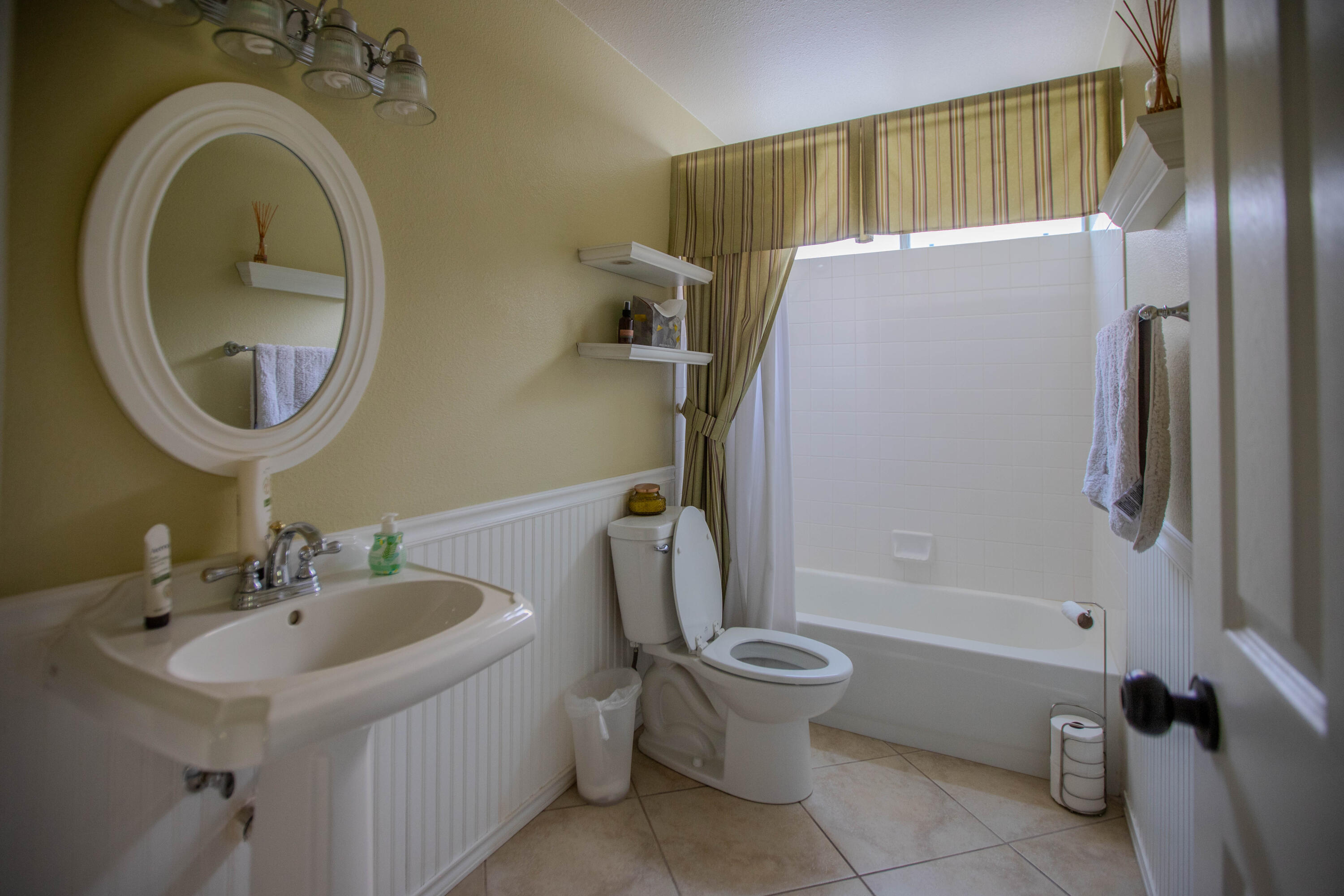 36852 Vía Del Rio Palmdale, CA 93550 - Photo 26 of 34 a bathroom with a sink a toilet and shower