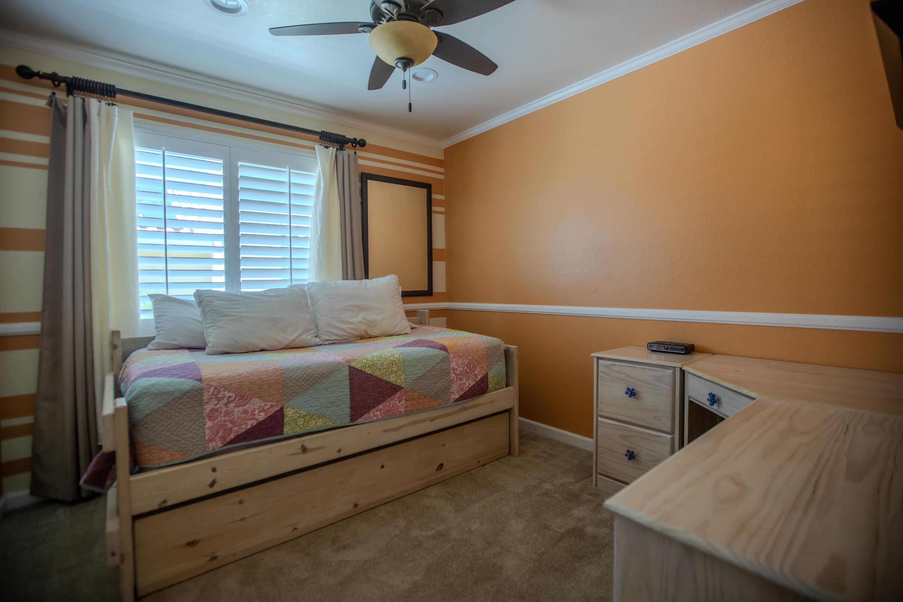 36852 Vía Del Rio Palmdale, CA 93550 - Photo 27 of 34 a bedroom with a bed and window