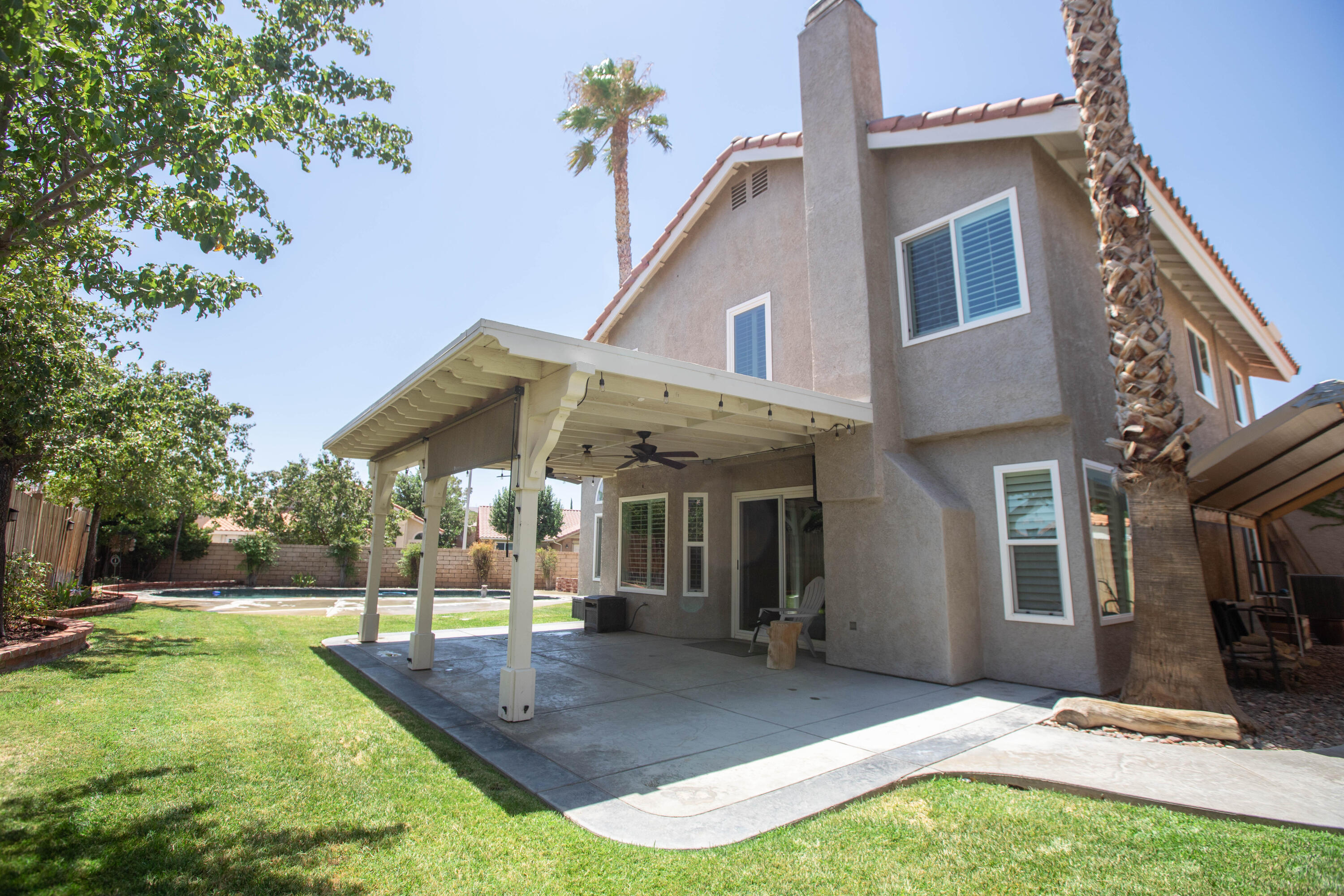 36852 Vía Del Rio Palmdale, CA 93550 - Photo 31 of 34 a view of a house with yard and sitting area