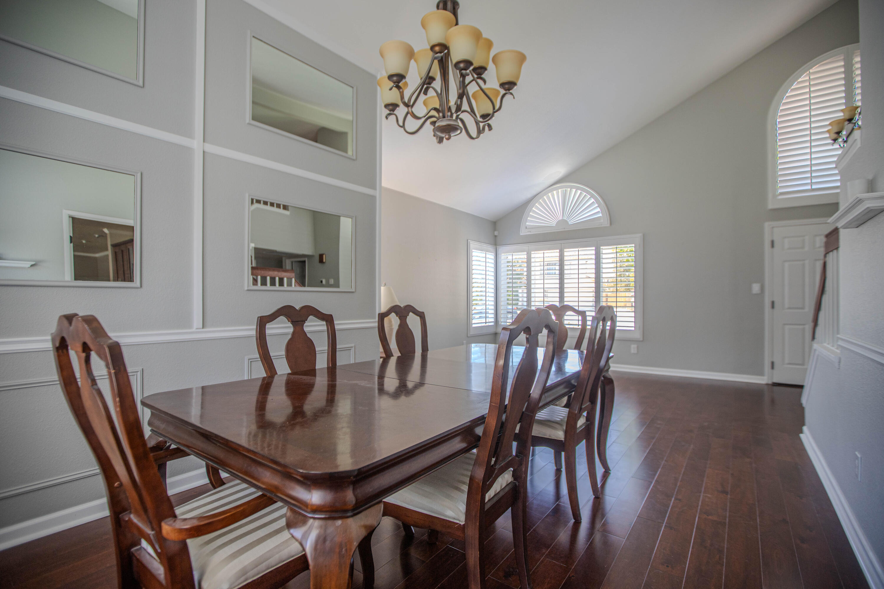 36852 Vía Del Rio Palmdale, CA 93550 - Photo 9 of 34 a view of a dining room with furniture window and wooden floor
