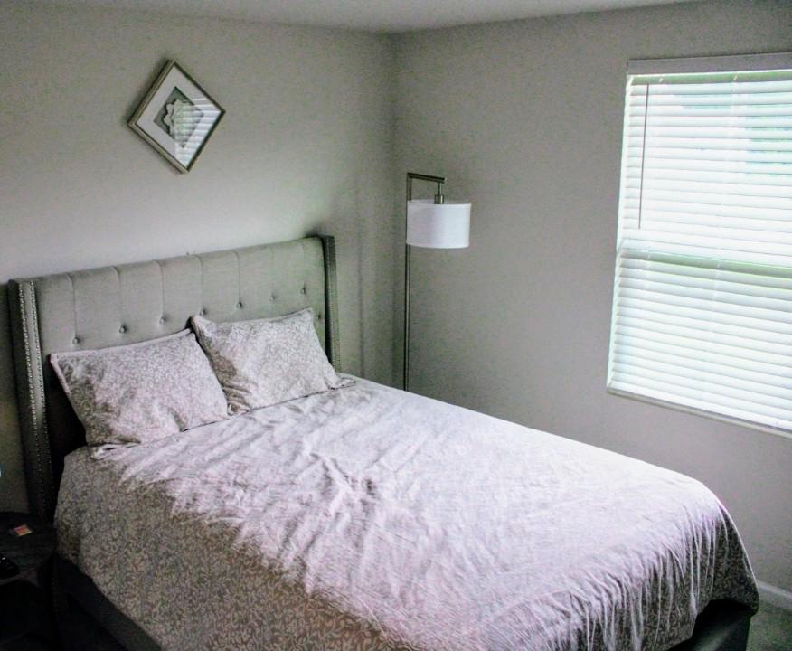 46 Mudstone Road Dover, DE 19904 - Photo 17 of 20 a large bed in a bedroom next to a window