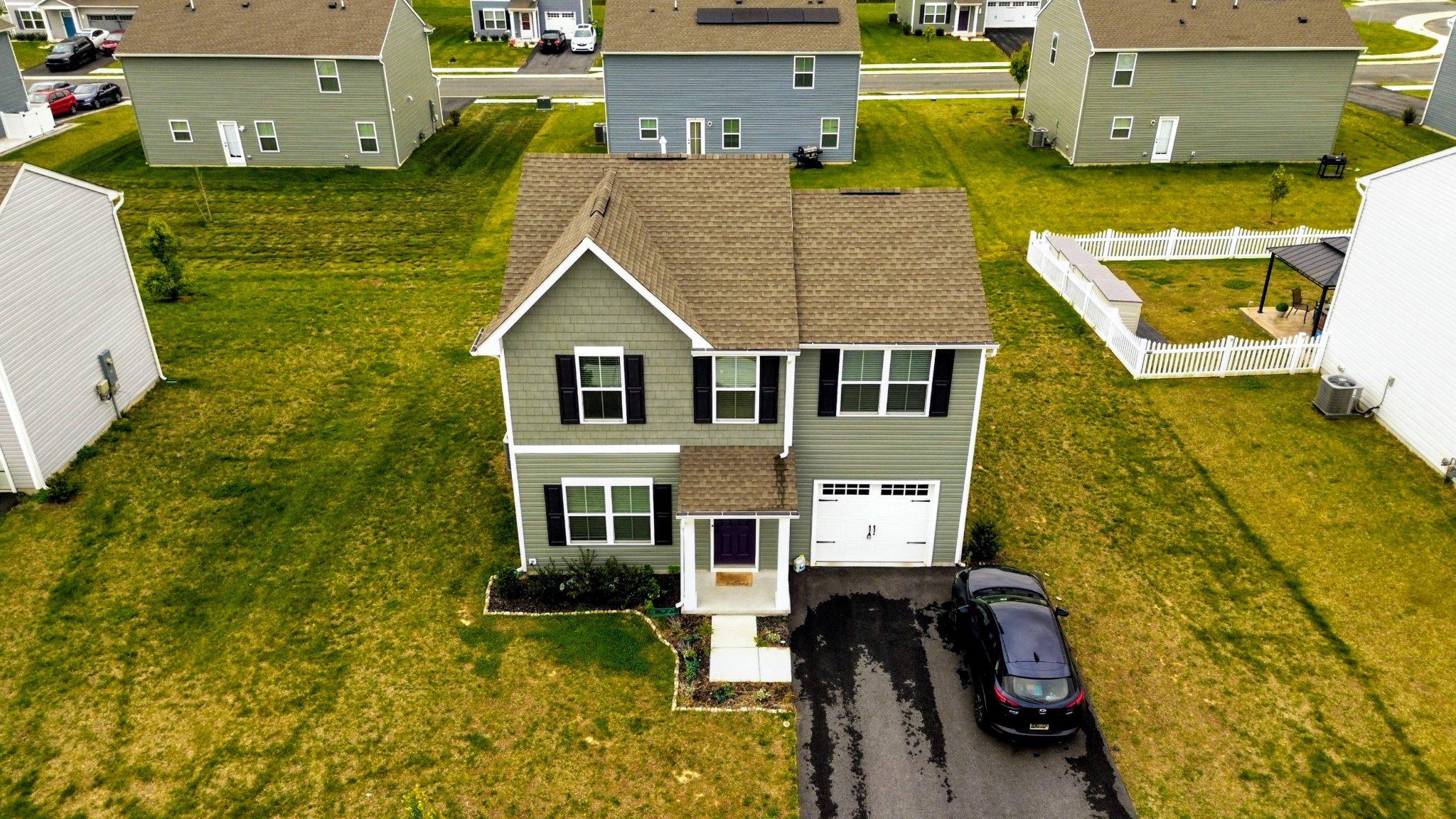 46 Mudstone Road Dover, DE 19904 - Photo 2 of 20 a aerial view of a house with pool