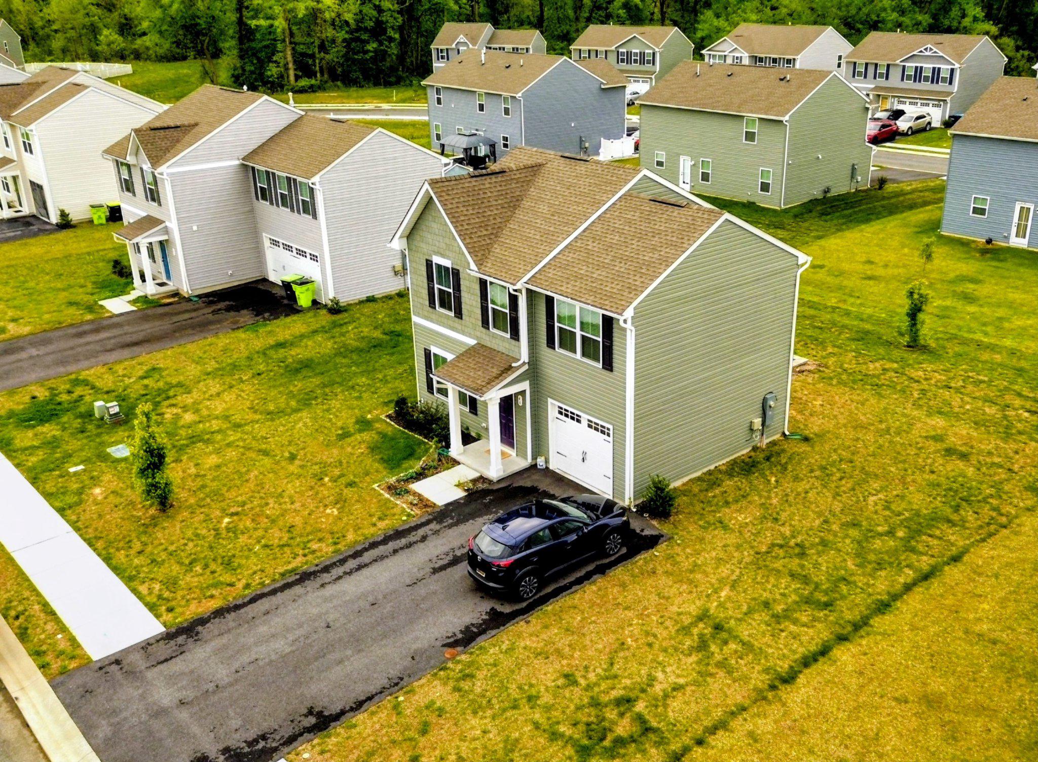 46 Mudstone Road Dover, DE 19904 - Photo 3 of 20 a aerial view of a house with swimming pool