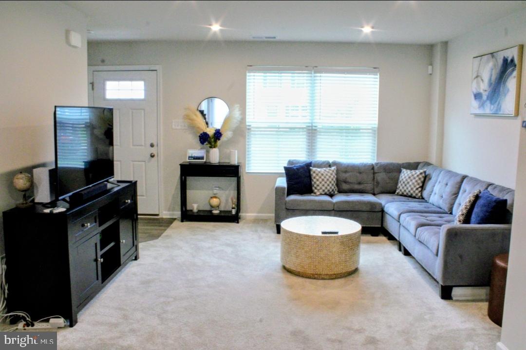46 Mudstone Road Dover, DE 19904 - Photo 5 of 20 a living room with furniture and a fireplace