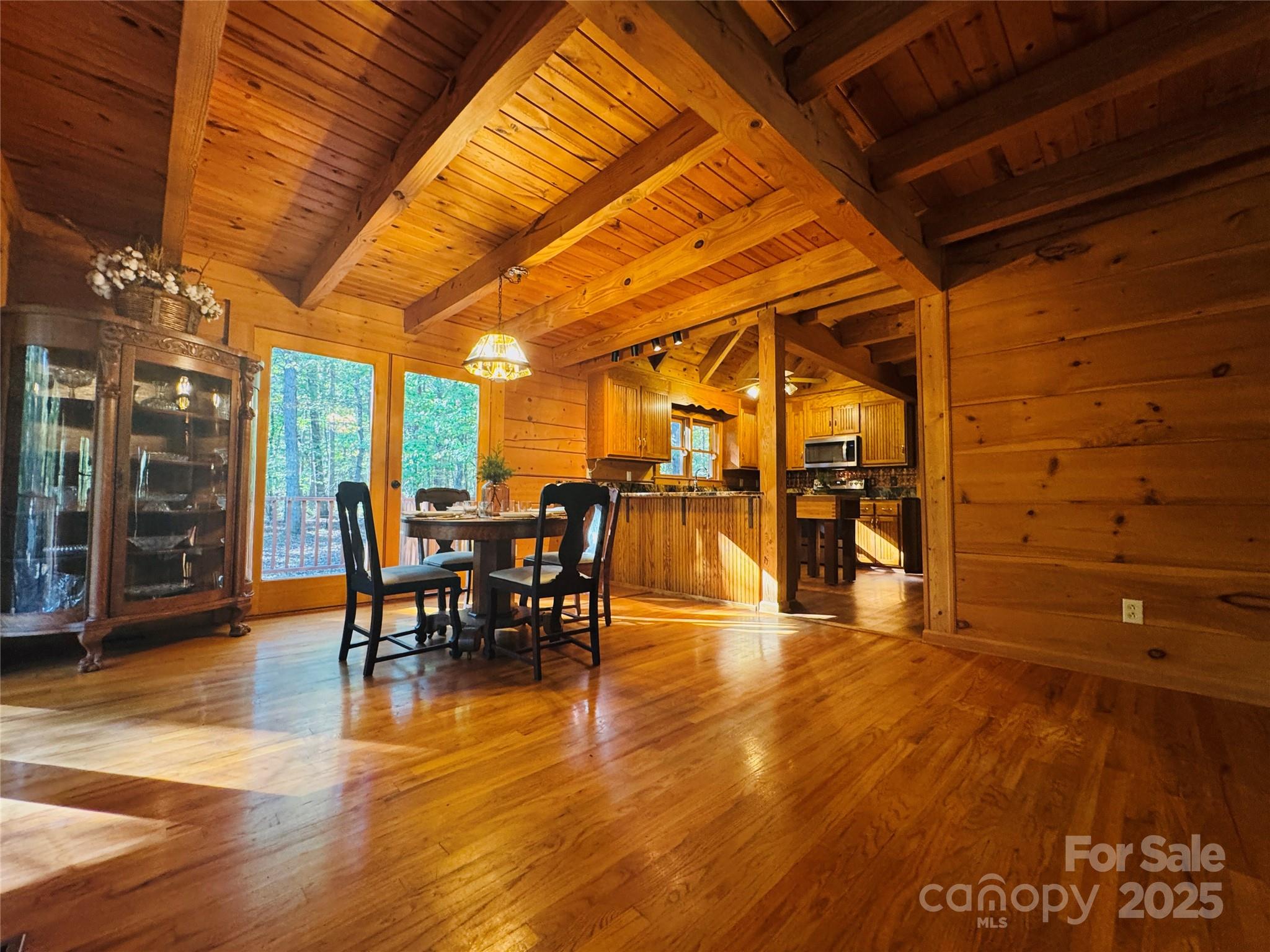 565 Barber Road Gold Hill, NC 28071 - Photo 15 of 42 a dining room with furniture and wooden floor