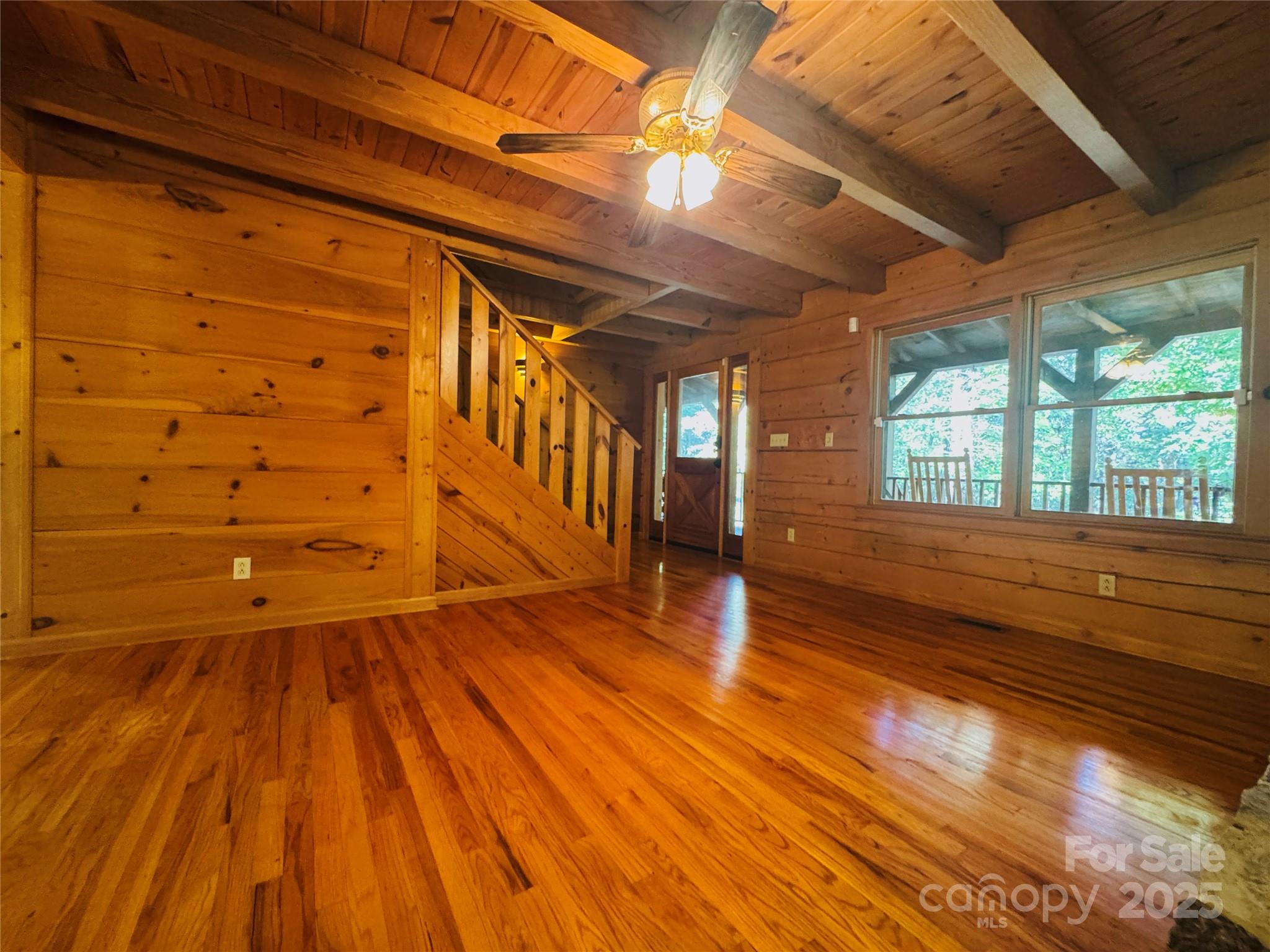565 Barber Road Gold Hill, NC 28071 - Photo 17 of 42 a view of an empty room with wooden floor and a window