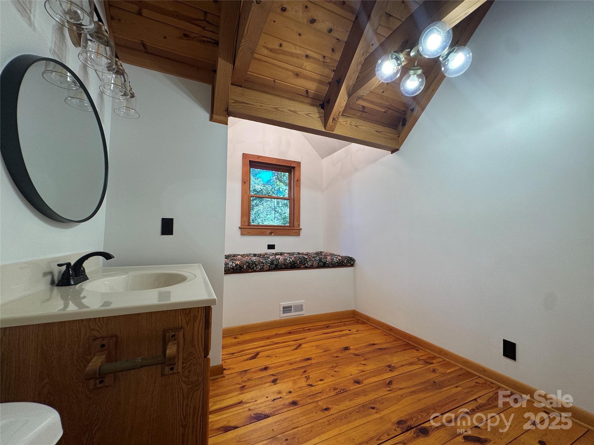 565 Barber Road Gold Hill, NC 28071 - Photo 27 of 42 a bathroom with a sink and a mirror