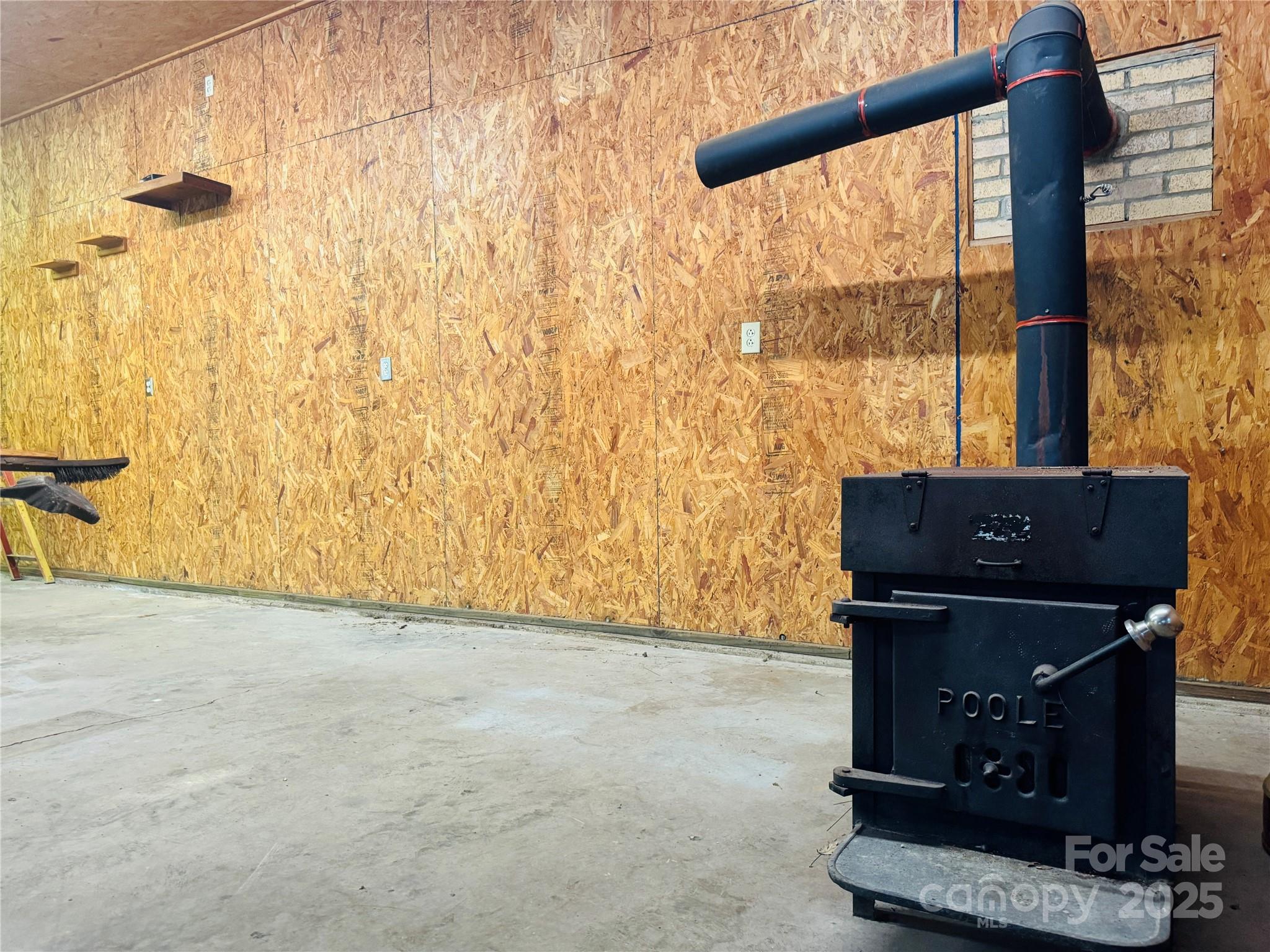 565 Barber Road Gold Hill, NC 28071 - Photo 31 of 42 a view of workspace with wooden floor
