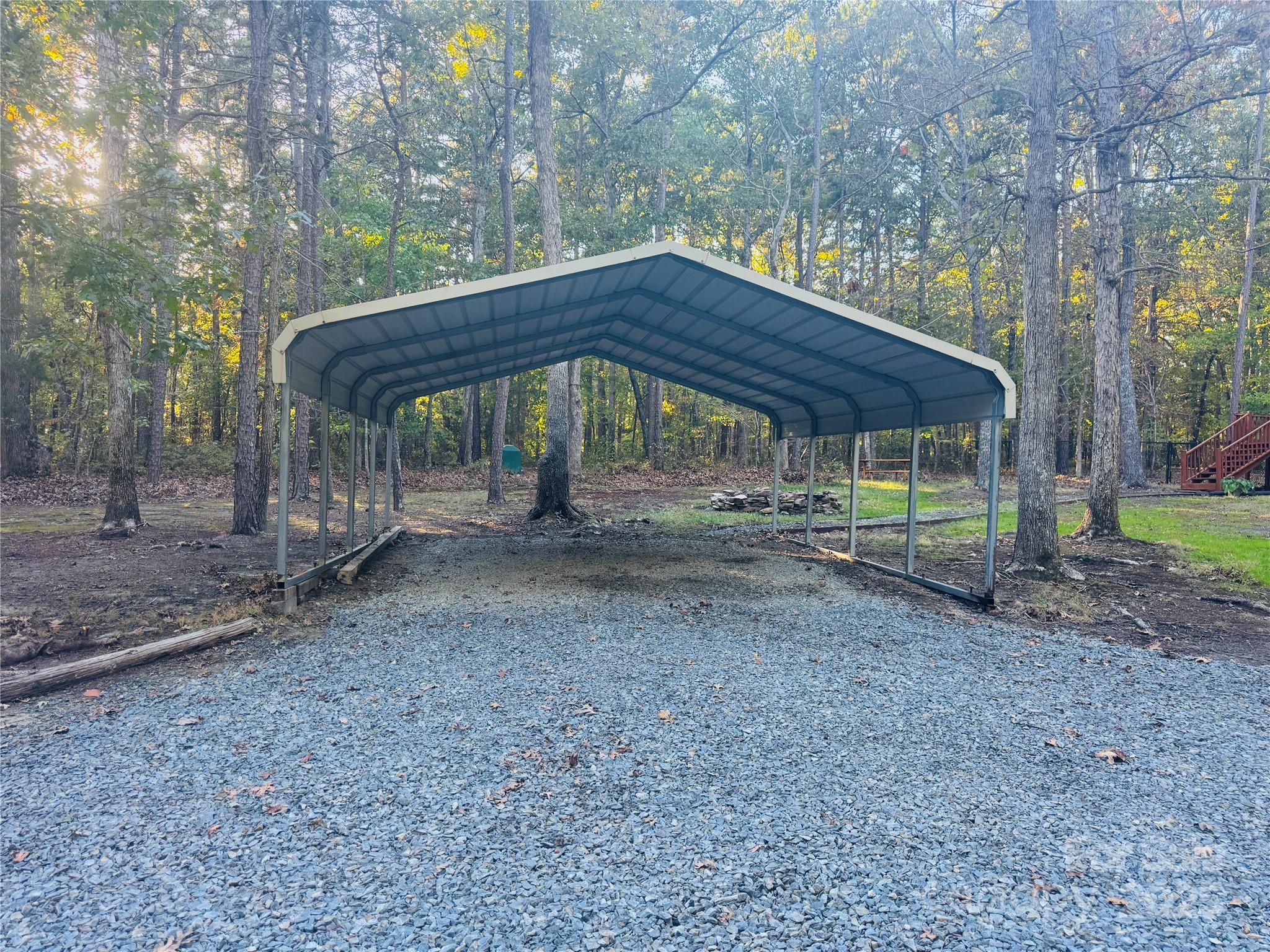 565 Barber Road Gold Hill, NC 28071 - Photo 33 of 42 a view of a wooden house with a yard