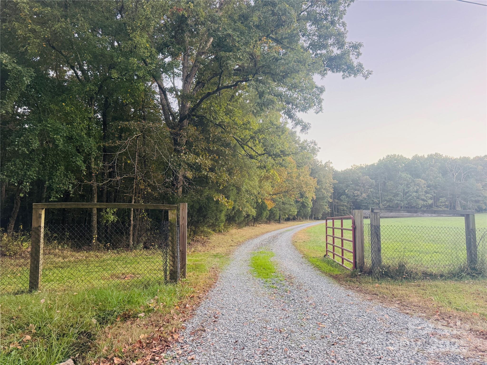 565 Barber Road Gold Hill, NC 28071 - Photo 5 of 42 a view of a lake view with a yard
