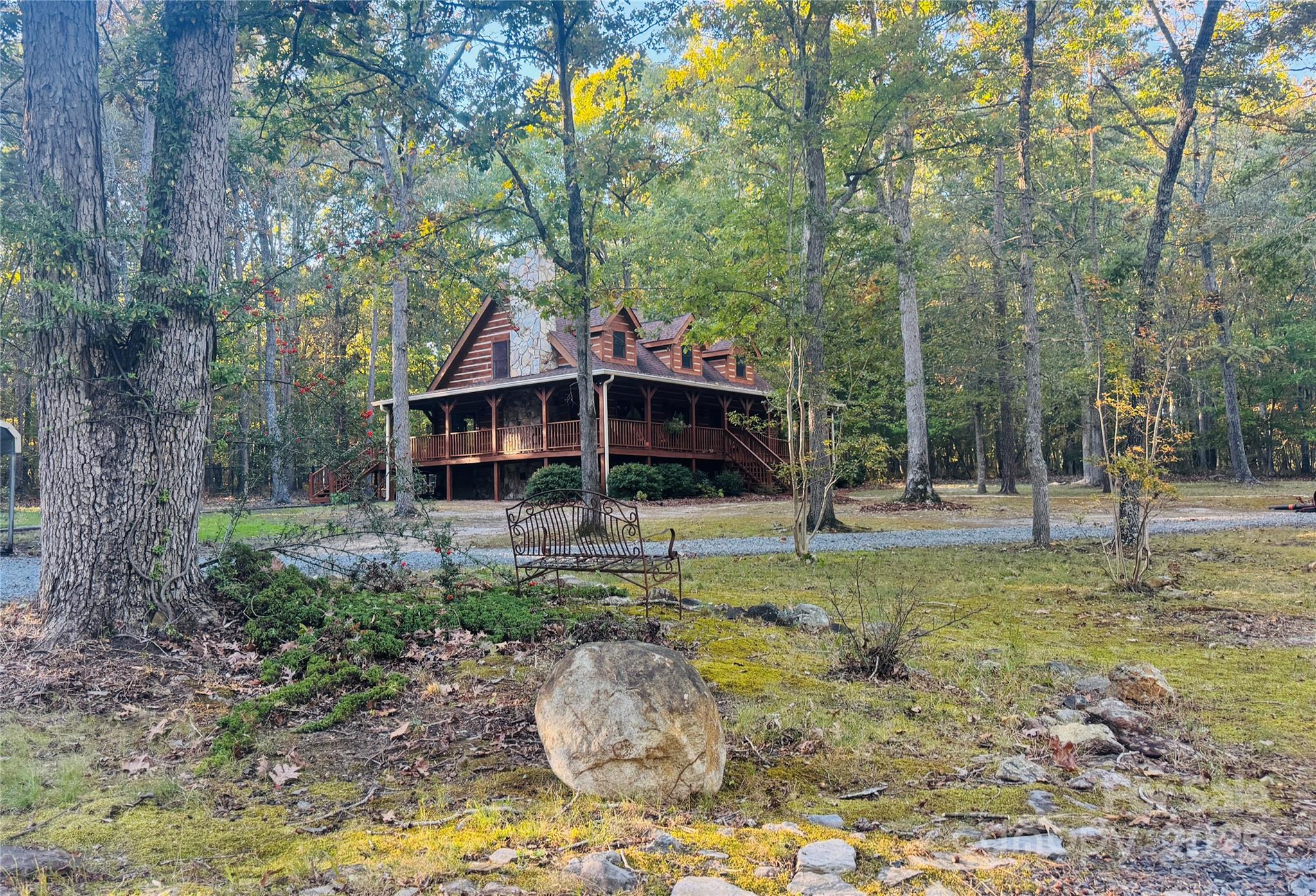 565 Barber Road Gold Hill, NC 28071 - Photo 8 of 42 a front view of a house with garden