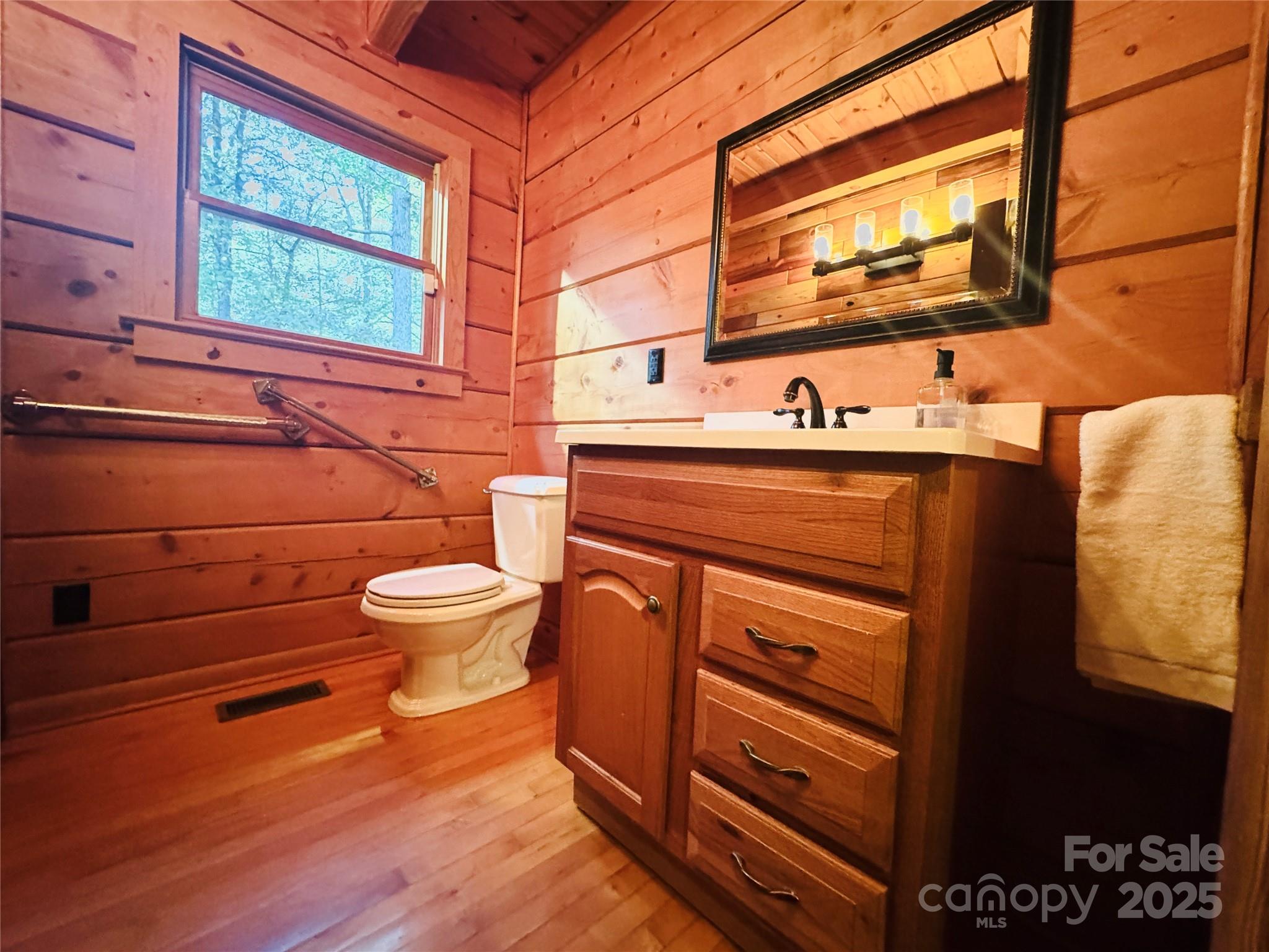 565 Barber Road Gold Hill, NC 28071 - Photo 10 of 42 a bathroom with a toilet and a sink