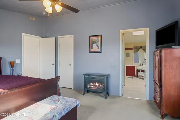 a bathroom with a sink vanity and a mirror